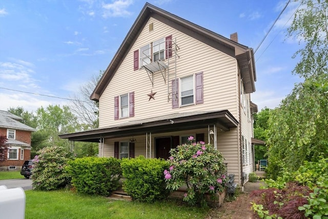 1438 Somerset Ave, Taunton, MA 02780 - view of front of property with a porch and a chimney