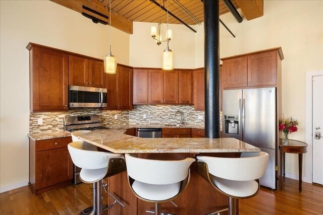 kitchen featuring backsplash, wooden ceiling, beamed ceiling, stainless steel appliances, and dark wood-type flooring
