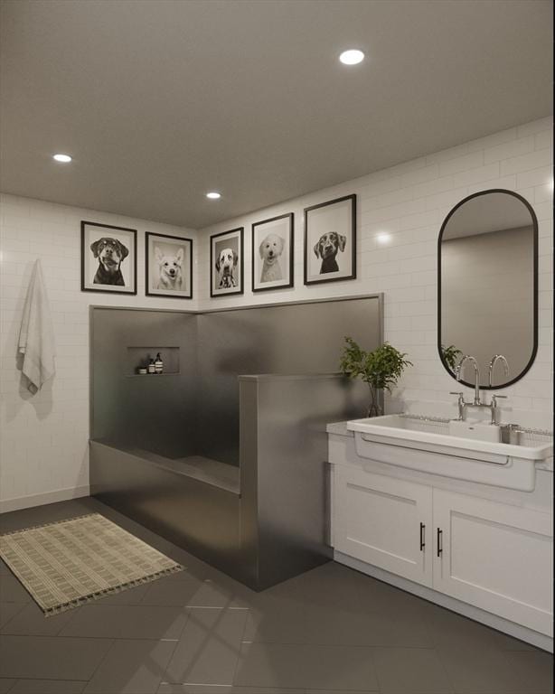 full bathroom featuring tile patterned flooring, vanity, and recessed lighting