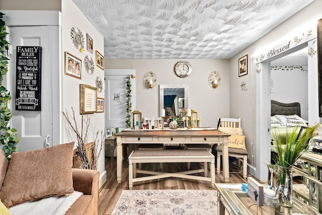 sitting room featuring wood finished floors