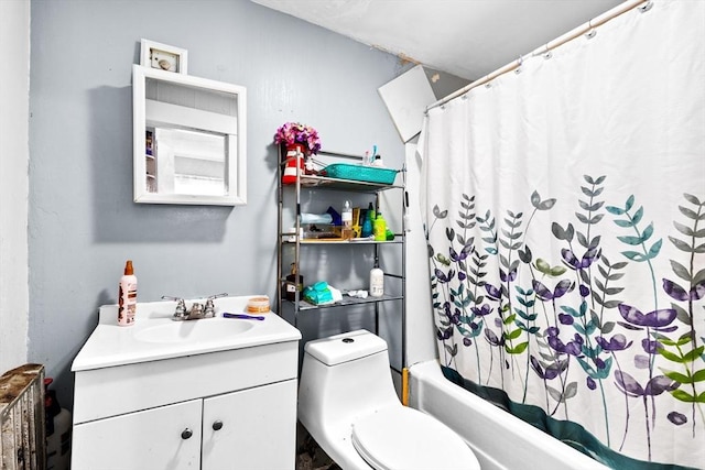 bathroom with toilet, vanity, and shower / tub combo with curtain