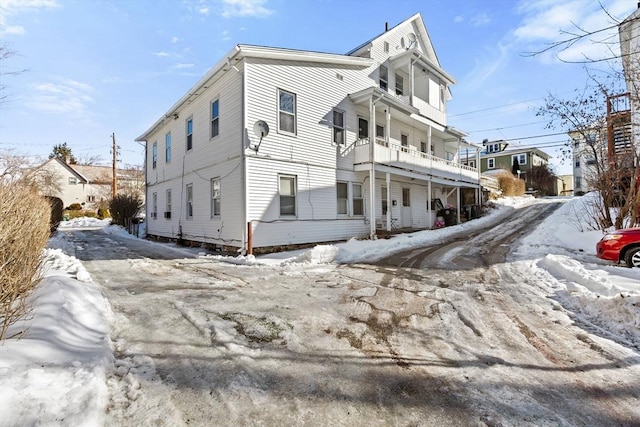 view of snow covered property