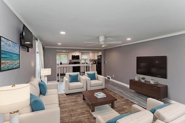 83 Chalmers St, Springfield, MA 01118 - living room with recessed lighting, a ceiling fan, wood finished floors, baseboards, and crown molding