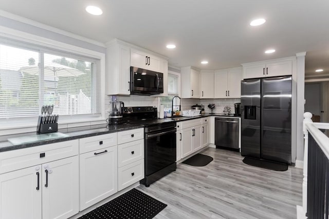 83 Chalmers St, Springfield, MA 01118 - kitchen with dishwashing machine, stainless steel fridge, electric range, healthy amount of natural light, and recessed lighting