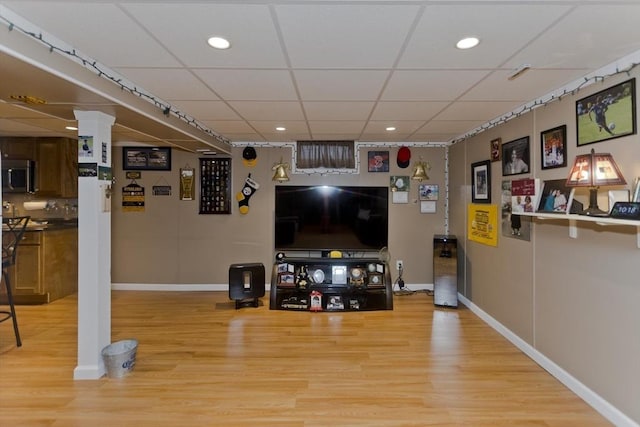 83 Chalmers St, Springfield, MA 01118 - living area featuring light wood-style flooring, baseboards, a drop ceiling, and recessed lighting