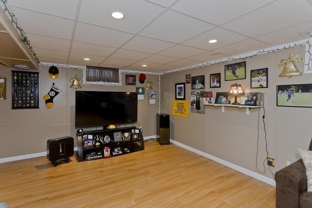 83 Chalmers St, Springfield, MA 01118 - living area with wood finished floors, a paneled ceiling, baseboards, and recessed lighting