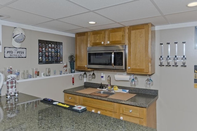 83 Chalmers St, Springfield, MA 01118 - kitchen featuring stainless steel microwave, a drop ceiling, a sink, recessed lighting, and brown cabinets