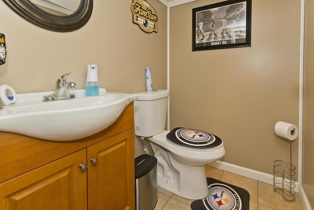 83 Chalmers St, Springfield, MA 01118 - bathroom featuring toilet, tile patterned floors, vanity, and baseboards