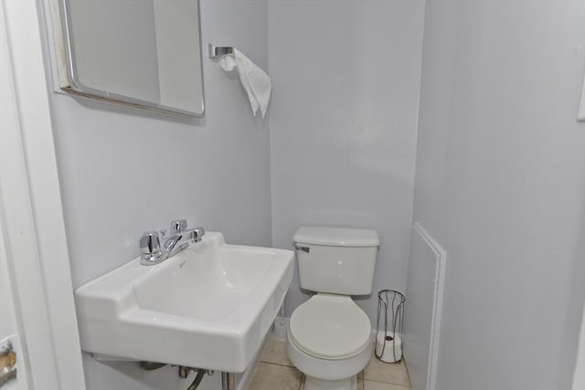 83 Chalmers St, Springfield, MA 01118 - bathroom featuring toilet, tile patterned floors, and a sink