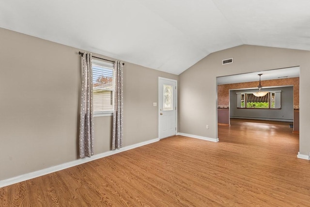 171 Duffy Dr, Taunton, MA 02780 - unfurnished room featuring light wood-style flooring, plenty of natural light, lofted ceiling, and baseboards