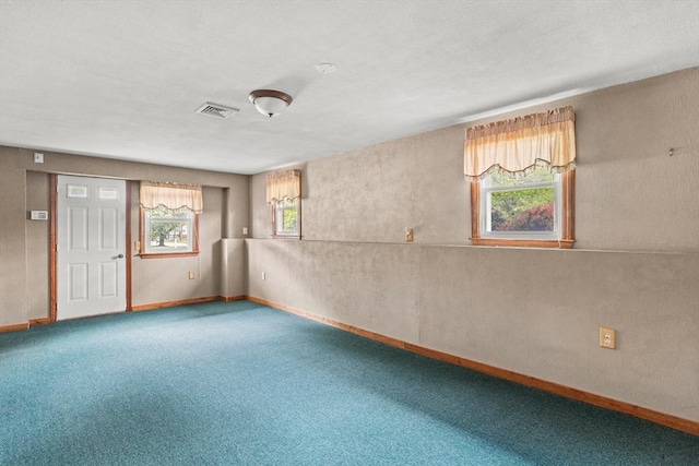 171 Duffy Dr, Taunton, MA 02780 - spare room with carpet, baseboards, and a textured wall