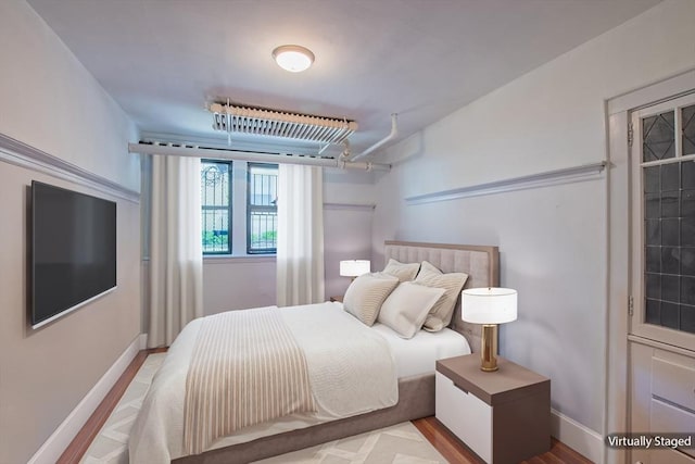 bedroom with baseboards