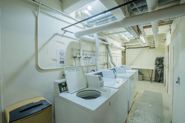 community laundry room with washing machine and dryer