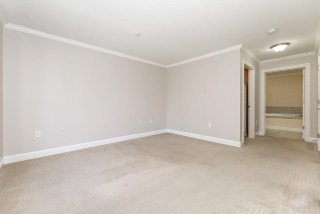 8 Crowninshield Unit 312, Peabody, MA 01960 - unfurnished room with ornamental molding, light carpet, baseboards, and a smoke detector