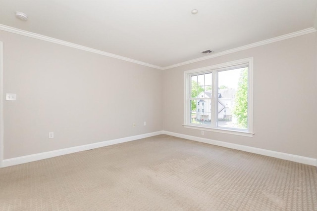 8 Crowninshield Unit 312, Peabody, MA 01960 - unfurnished room featuring ornamental molding, light carpet, baseboards, and a smoke detector