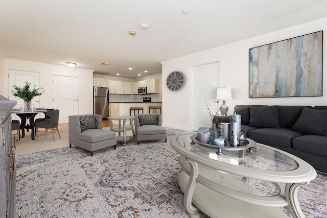 8 Crowninshield Unit 312, Peabody, MA 01960 - living room featuring ornamental molding and baseboards