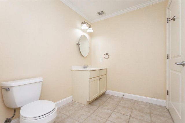 8 Crowninshield Unit 312, Peabody, MA 01960 - half bath featuring crown molding, vanity, baseboards, toilet, and tile patterned flooring
