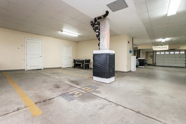 8 Crowninshield Unit 312, Peabody, MA 01960 - parking deck featuring baseboards