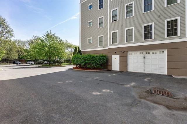8 Crowninshield Unit 312, Peabody, MA 01960 - view of property with a garage