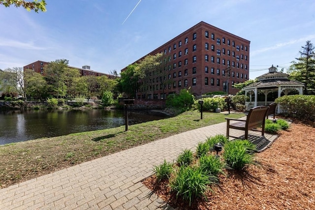 8 Crowninshield Unit 312, Peabody, MA 01960 - view of community featuring a gazebo, a water view, and a lawn