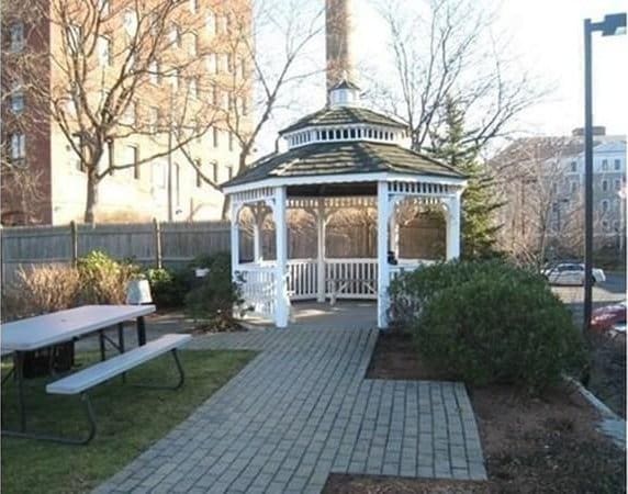 8 Crowninshield Unit 312, Peabody, MA 01960 - view of community with a gazebo and fence