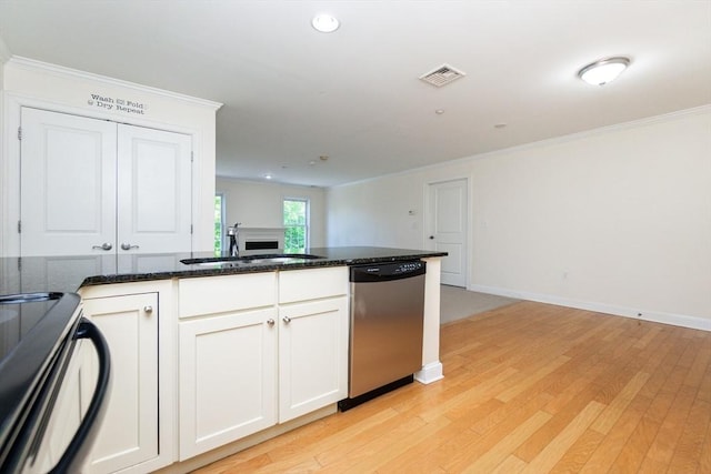 8 Crowninshield Unit 312, Peabody, MA 01960 - kitchen with stainless steel dishwasher, a sink, light wood-style flooring, dark stone counters, and ornamental molding
