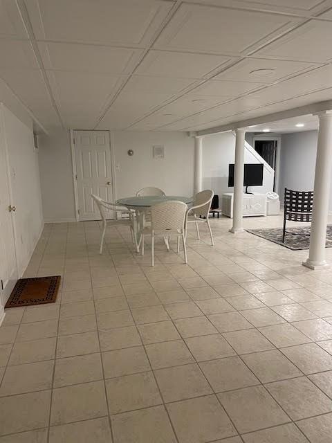 5 Hickory Rd, Southborough, MA 01772 - dining area featuring light tile patterned floors and decorative columns