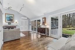 5 Hickory Rd, Southborough, MA 01772 - living room featuring vaulted ceiling and wood finished floors