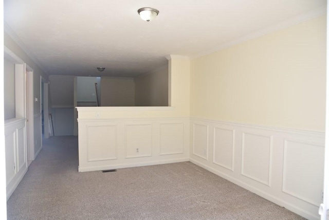27 Christine Dr, Worcester, MA 01604 - spare room with light colored carpet, wainscoting, and a decorative wall