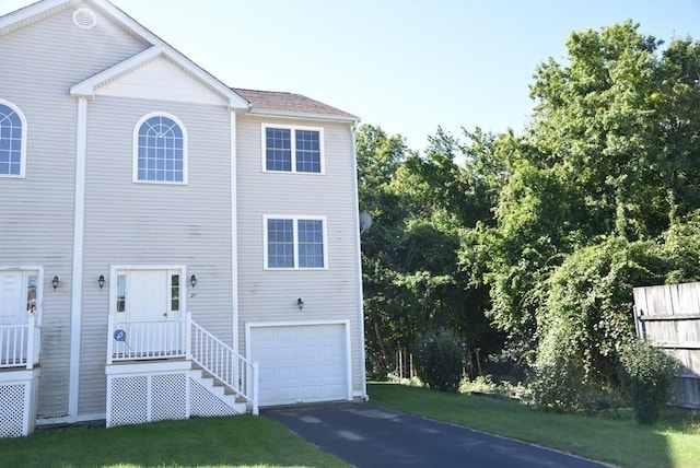 27 Christine Dr, Worcester, MA 01604 - view of front of property with an attached garage, driveway, and a front yard