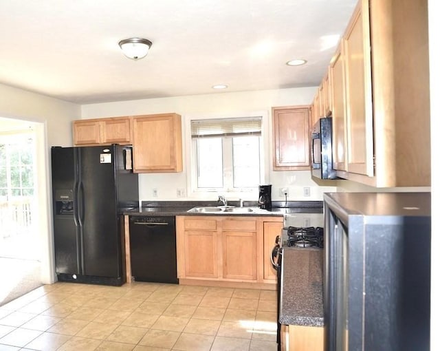 27 Christine Dr, Worcester, MA 01604 - kitchen with black appliances, healthy amount of natural light, dark countertops, light tile patterned floors, and recessed lighting
