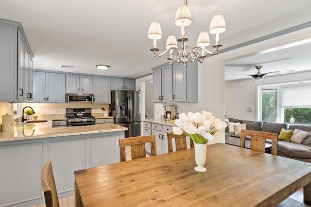 18 Mann St, Bellingham, MA 02019 - dining room featuring ceiling fan and a chandelier