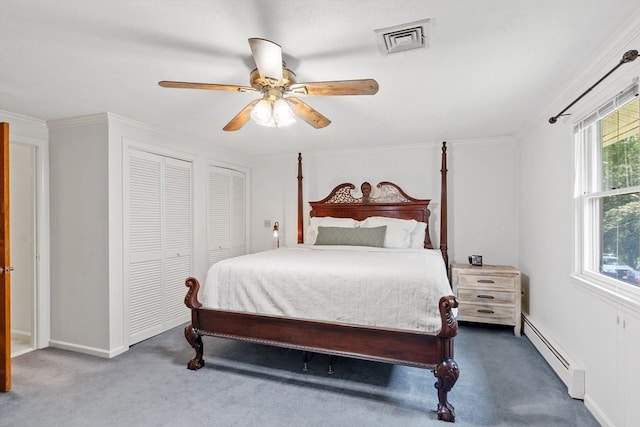18 Mann St, Bellingham, MA 02019 - bedroom with a baseboard heating unit, carpet, a ceiling fan, crown molding, and multiple closets