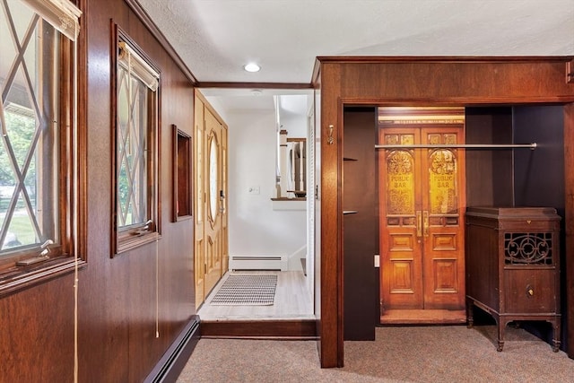 18 Mann St, Bellingham, MA 02019 - hall featuring carpet floors, a baseboard heating unit, and ornamental molding