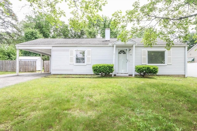 15 Fredette St, Springfield, MA 01109 - view of front facade featuring asphalt driveway, a chimney, and a carport