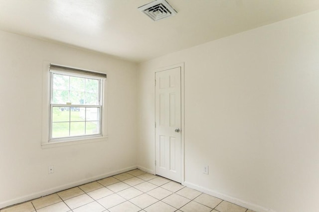 15 Fredette St, Springfield, MA 01109 - unfurnished room featuring light tile patterned flooring and baseboards