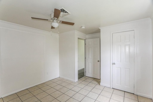 15 Fredette St, Springfield, MA 01109 - unfurnished bedroom featuring ornamental molding, light tile patterned flooring, and a ceiling fan