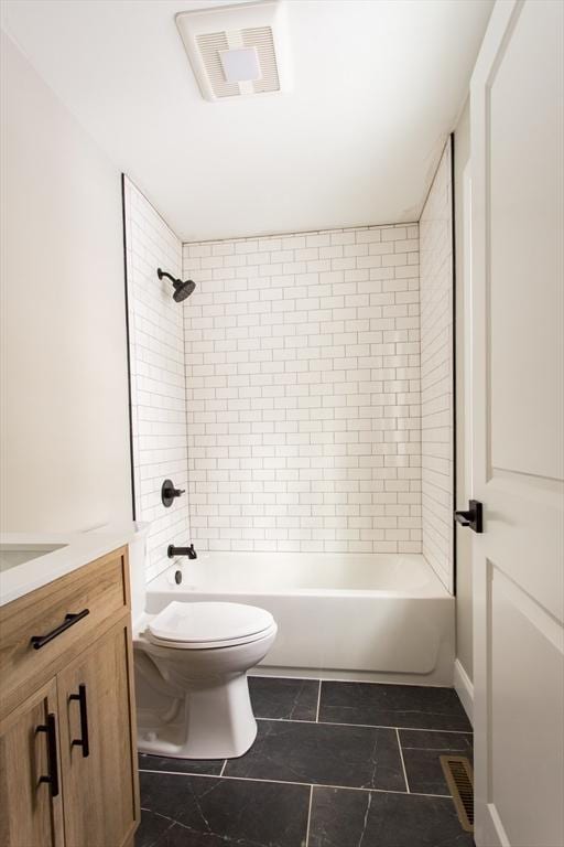 bathroom with bathtub / shower combination, visible vents, vanity, and toilet