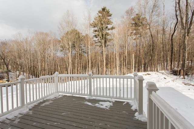 view of snow covered deck