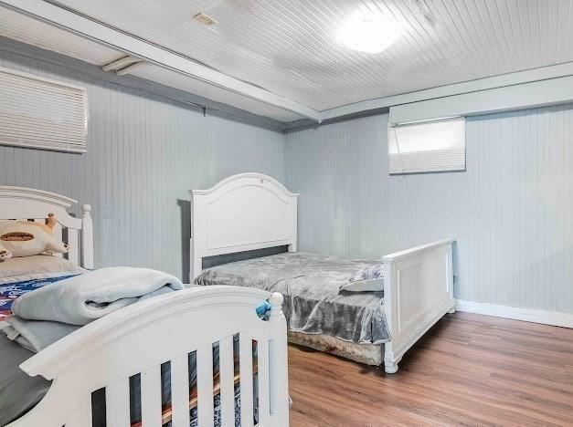 26 Beulah St, Framingham, MA 01701 - bedroom featuring wood finished floors and baseboards