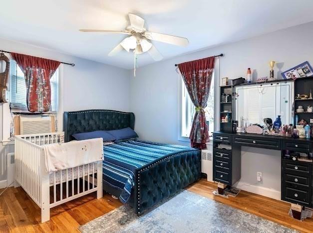 26 Beulah St, Framingham, MA 01701 - bedroom featuring wood finished floors and a ceiling fan