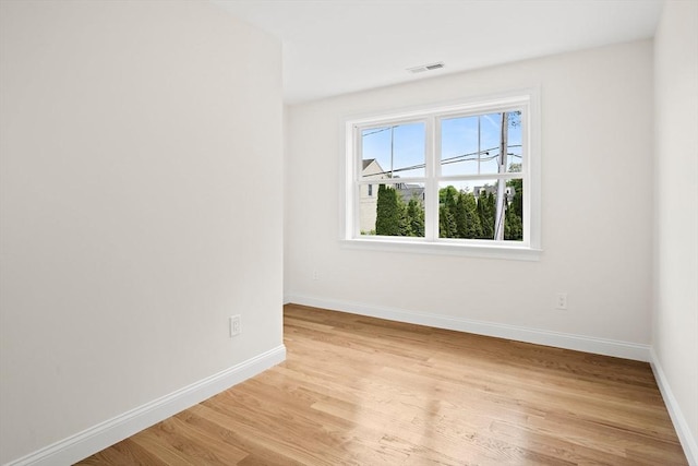 7 Locust St, Woburn, MA 01801 - unfurnished room with light wood-type flooring and baseboards