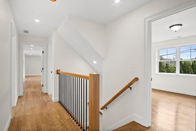 7 Locust St, Woburn, MA 01801 - hall with an upstairs landing, light wood-type flooring, baseboards, and recessed lighting