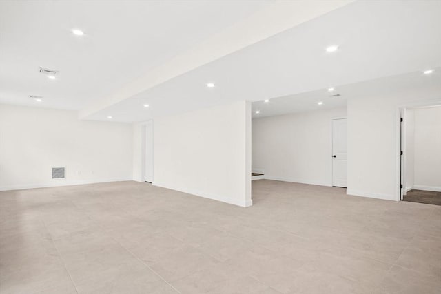 7 Locust St, Woburn, MA 01801 - finished basement featuring recessed lighting and baseboards