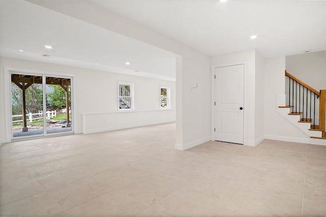 7 Locust St, Woburn, MA 01801 - unfurnished room featuring stairs, recessed lighting, light tile patterned flooring, and baseboards