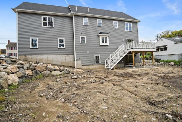 7 Locust St, Woburn, MA 01801 - rear view of property featuring stairs and a wooden deck