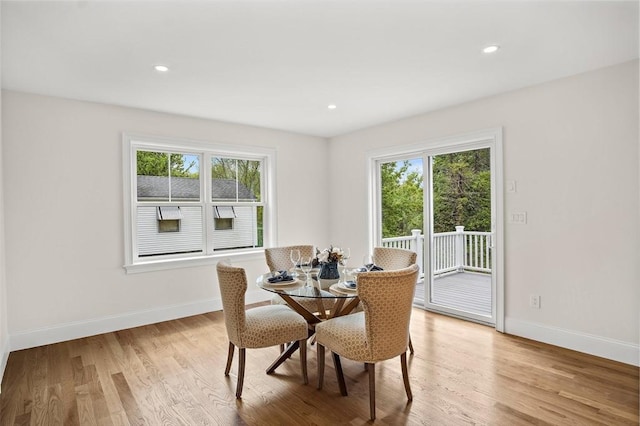 7 Locust St, Woburn, MA 01801 - dining area with baseboards, light wood-style flooring, and recessed lighting