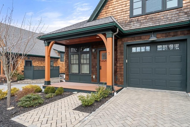 property entrance with a garage