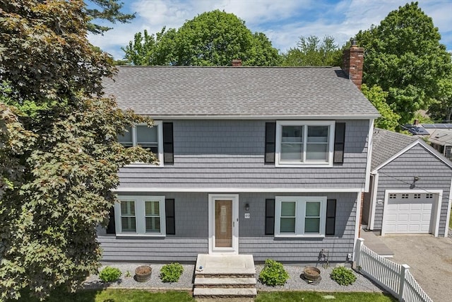 49 Pinehurst Ave, Methuen, MA 01844 - colonial inspired home with a chimney, an attached garage, a shingled roof, and driveway