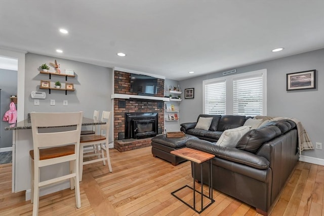 49 Pinehurst Ave, Methuen, MA 01844 - living area with light wood finished floors, recessed lighting, and baseboards